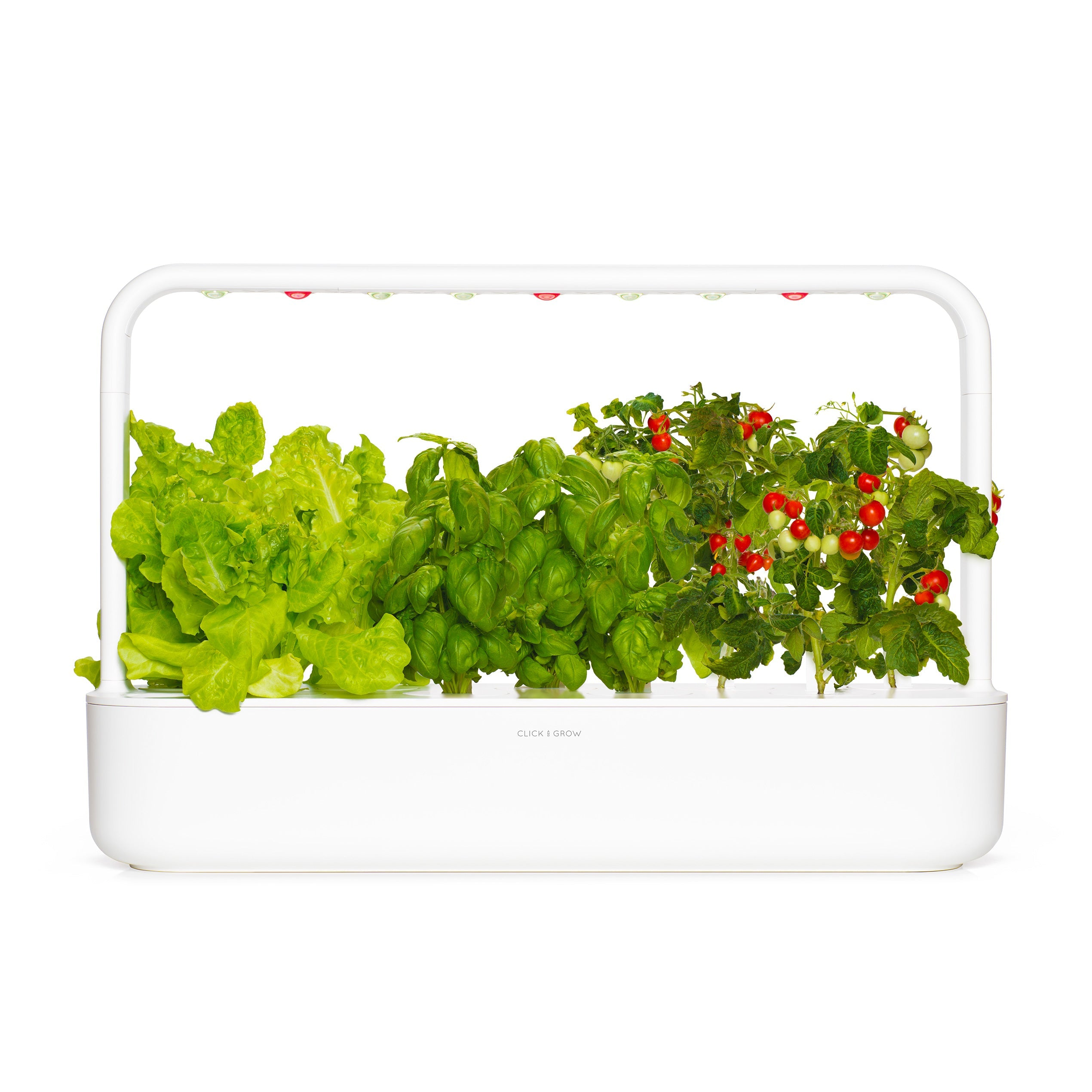 A smart indoor garden system featuring lettuce, basil, and cherry tomatoes with an integrated LED grow light for at-home cultivation.