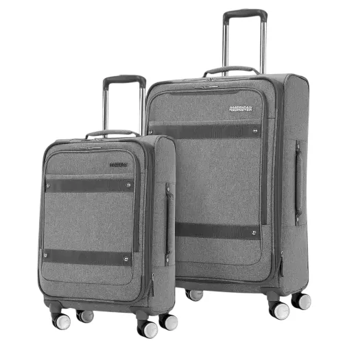 Two gray soft-shell suitcases with telescopic handles and four wheels, featuring a larger and a smaller size.