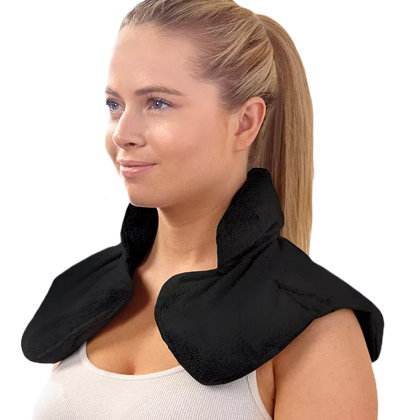 A person is wearing a black heated neck and shoulder wrap designed for muscle relief and relaxation.