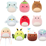A collection of soft plush toys featuring assorted cute characters, including animals like a shark, penguin, and bear, as well as imaginative creatures like a jellyfish and coconut. These colorful plushies have a fun and whimsical design.