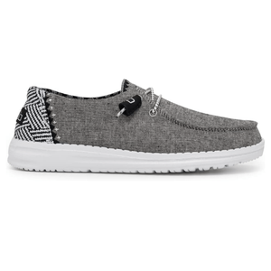Casual slip-on shoe with a gray fabric upper, white sole, and patterned heel detail in black and white. Features a lace-up design with black and white accents.