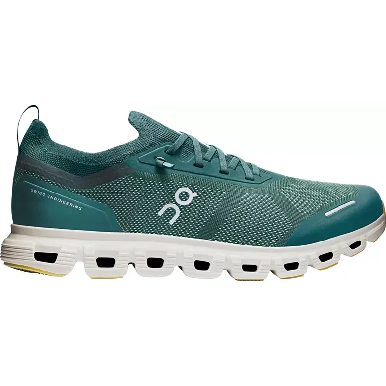A teal athletic shoe with a white sole, featuring a unique cushioning design and the text \“Swiss Engineering\“ on the side.