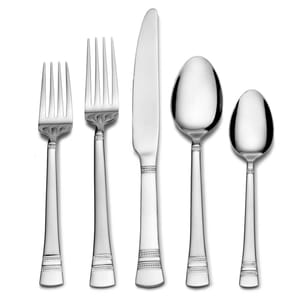 Five-piece stainless steel cutlery set: two forks, one knife, one tablespoon, and one teaspoon, each with a decorative pattern on the handles.