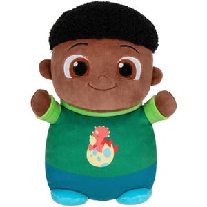 A plush toy with a round face, big eyes, and a cheerful smile, wearing a green shirt featuring a graphic of a dinosaur and blue shoes.
