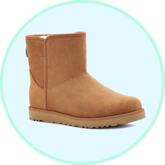 A tan, short, suede boot with a rubber sole.