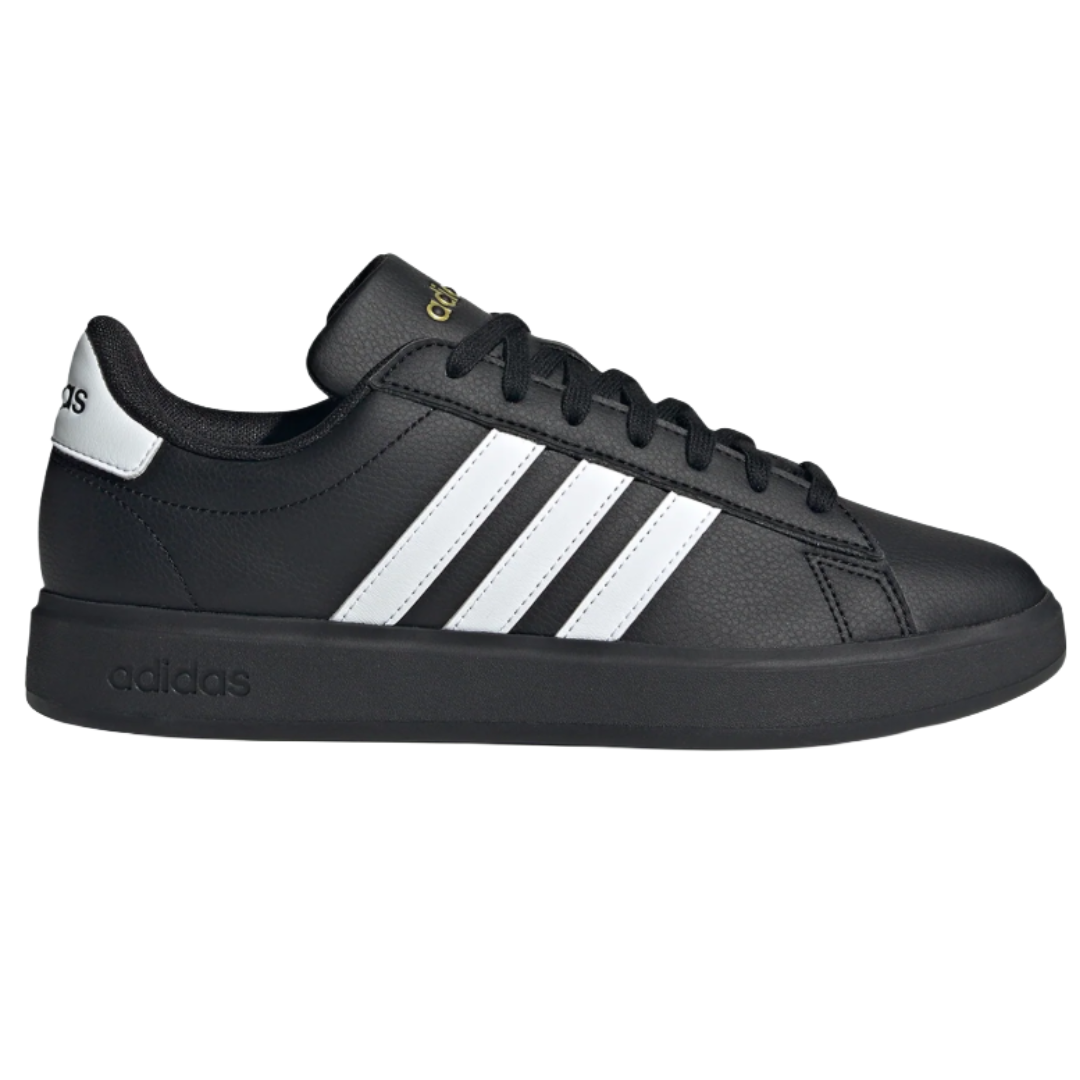 A black Adidas sneaker with white stripes and branding on the side and heel.