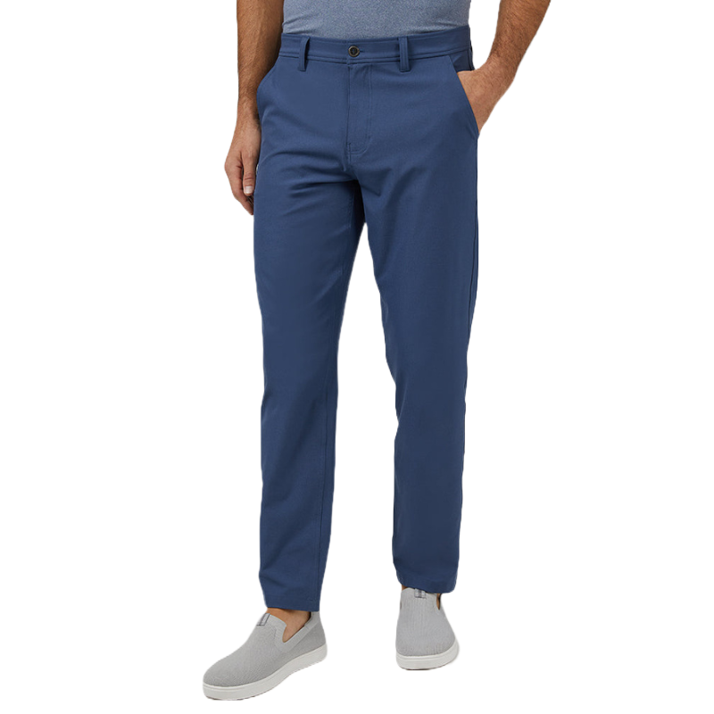 Blue pants with a classic fit, worn by a person paired with a gray shirt and slip-on shoes.