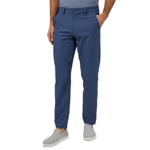 Blue pants with a classic fit, worn by a person paired with a gray shirt and slip-on shoes.