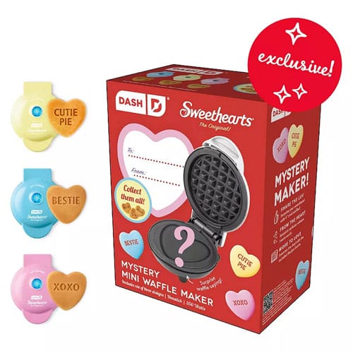 A mini waffle maker with various Valentine's Day sayings.