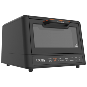 Blackstone E-Series countertop oven with a digital control panel, featuring temperature and timer settings, specifically designed for baking pizzas.