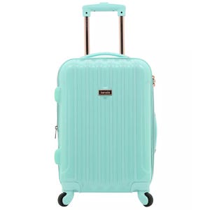A mint green hardshell suitcase with four wheels and an extendable handle, featuring vertical ridges and a front brand nameplate.