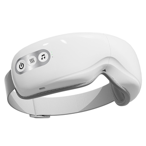 A white eye massage device with a strap, featuring buttons for power, heating, and music.