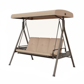 A three-seater patio porch swing with a beige canopy and cushions, set upon a sturdy metal frame with decorative metalwork on the sides.