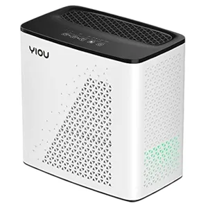 A rectangular air purifier with a white body, black top, and triangular perforations on the sides and front, featuring a control panel on the top surface.