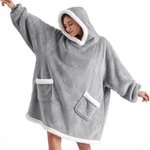 Gray oversized wearable blanket with a hood, featuring white fleece trim and two front pockets.