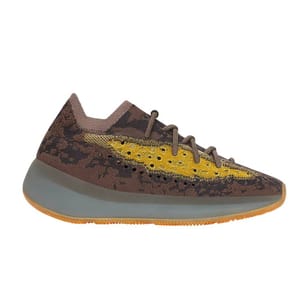 Adidas Yeezy 380 sneakers with a brown and yellow knit upper featuring a camo-like pattern, gray cushioned midsole, and a gum rubber outsole. They have a sleek, low-profile silhouette with a lacing system for a secure fit.