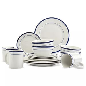 A 16-piece dinnerware set featuring a classic white design with blue stripes. The set includes mugs, bowls, and plates, suitable for table settings, offering a simple and elegant look for meals.