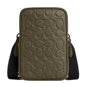 The Coach Outlet Aden Crossbody is an olive-colored, rectangular bag featuring an embossed signature pattern on the front. It has a detachable black strap and is designed for convenient, stylish carrying.