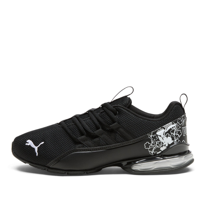 Black Puma Riaze Prowl Floral Running Shoes featuring a mesh upper, visible heel cushioning, and floral details on the heel.