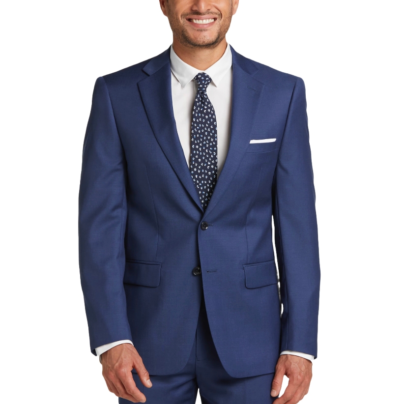 Blue Calvin Klein wool suit featuring a two-button jacket, notch lapels, and a matching slim-cut dress pants. Worn with a white dress shirt and patterned navy tie, it offers a classic and professional look.