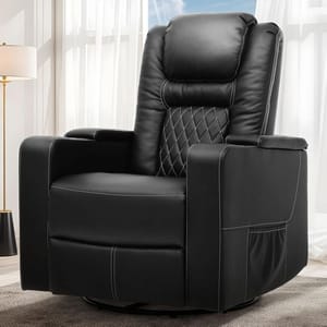 A black reclining chair with plush upholstery and diamond-patterned stitching on the backrest, set in a well-lit room with a window and a floor lamp in the background.