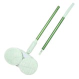 A green and white electric mop with dual rotating pads, featuring a removable handle for easy storage.