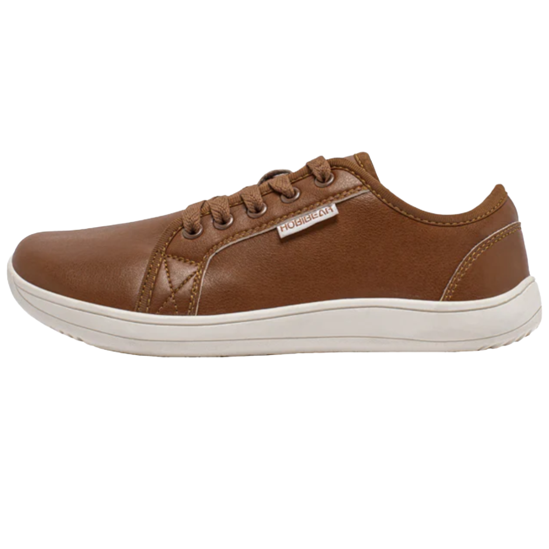 Brown casual sneaker with a white sole and lace-up design.