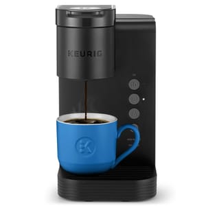 Keurig coffee maker brewing into a blue mug, featuring buttons for 6, 8, and 10 oz options.