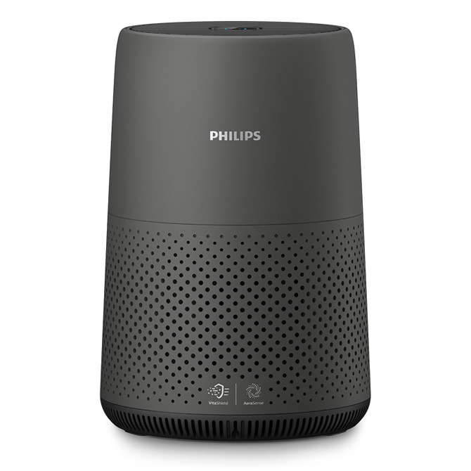 A cylindrical Philips HEPA air purifier with a dark gray exterior, featuring air intake perforations and branding on the front.