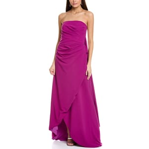 Strapless magenta gown with draped detailing and a floor-length hem. Features a wrapped design and subtle ruching for an elegant silhouette.