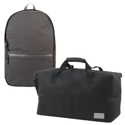 A gray backpack with a front zipper pocket and a black duffel bag with dual handles and a small label.