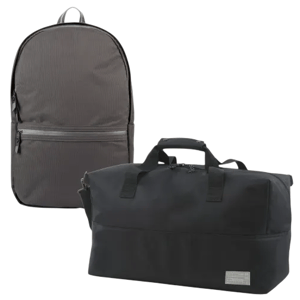 A gray backpack with a front zipper pocket and a black duffel bag with dual handles and a small label.