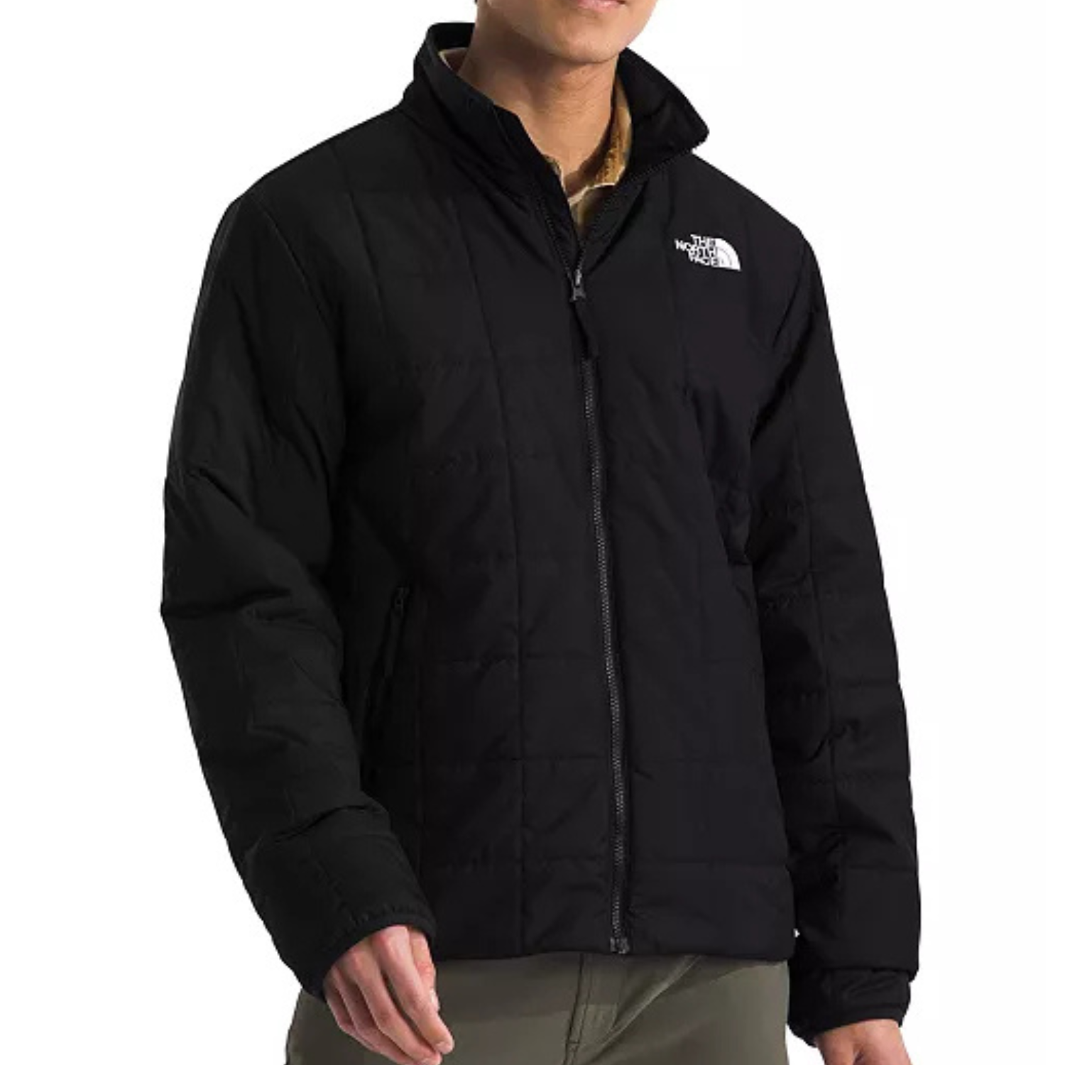 The North Face Junction Jacket is a black, quilted jacket with a high collar and zip front. It features the brand's logo on the chest and has side pockets, offering a sleek, functional design suitable for colder weather.