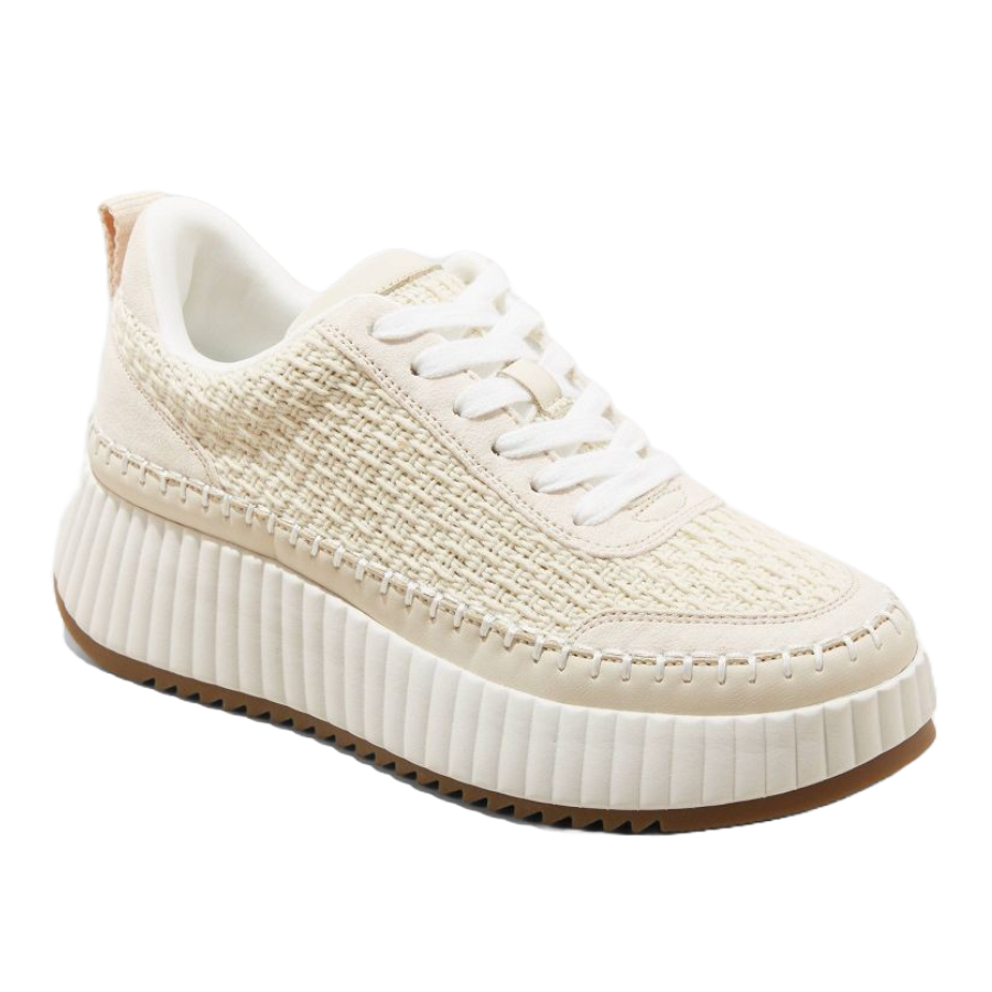 Cream-colored sneakers with a textured fabric upper, white laces, and a thick, ribbed platform sole with a gum outsole.