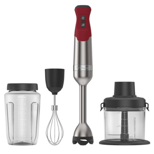 A Vitamix immersion blender set with various attachments: a red and stainless steel hand blender, whisk attachment, blending jar with lid, and a food processor container.