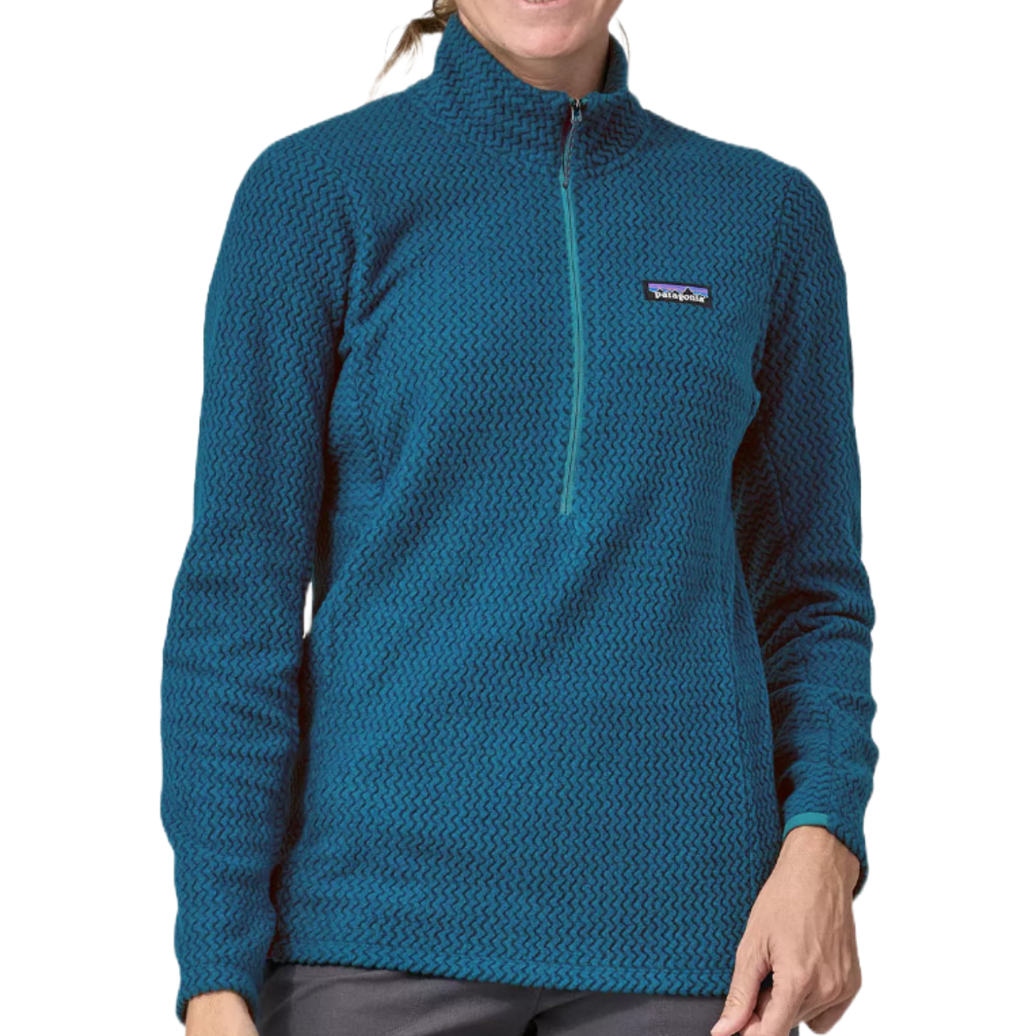 A blue, long-sleeve Patagonia R1 Air 1/2-Zip Pullover featuring a textured pattern and a front half-zip closure with the brand logo on the chest.