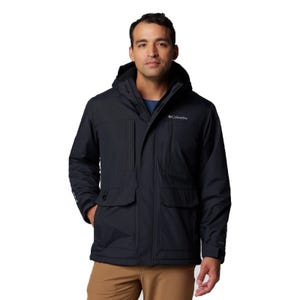 The Columbia Hooded Sherpa-Lined Jacket is a black, insulated outerwear piece featuring a hood and multiple pockets. It's designed for warmth and functionality with a sleek, casual look.
