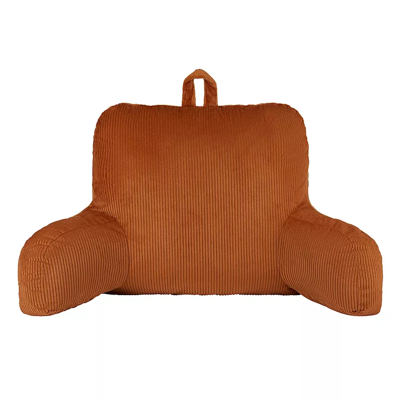 Corduroy bed rest pillow with arms and a carry handle at the top, in an orange color.