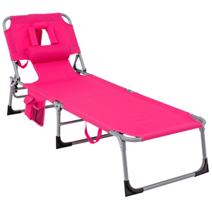 A pink adjustable lounge chair with a headrest and an integrated face hole, featuring a side storage pocket and a metal frame.