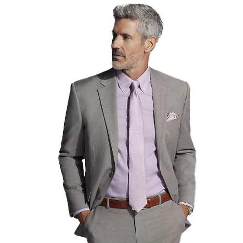 A man sports a modern fit gray windowpane suit with a subtle check pattern, paired with a light pink dress shirt and a matching tie. The outfit includes a coordinating pocket square and brown belt.