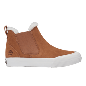 Timberland Cozy Sneaker Boots are tan, high-top shoes with white fuzzy lining, a white rubber sole, elastic side panels, and a heel pull tab for easy wear. They feature a rugged design with the Timberland logo on the side.