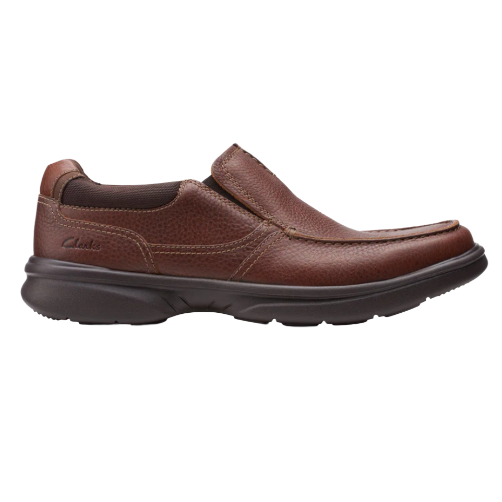 Brown leather slip-on shoe from Clarks with a durable, cushioned sole and visible stitching.