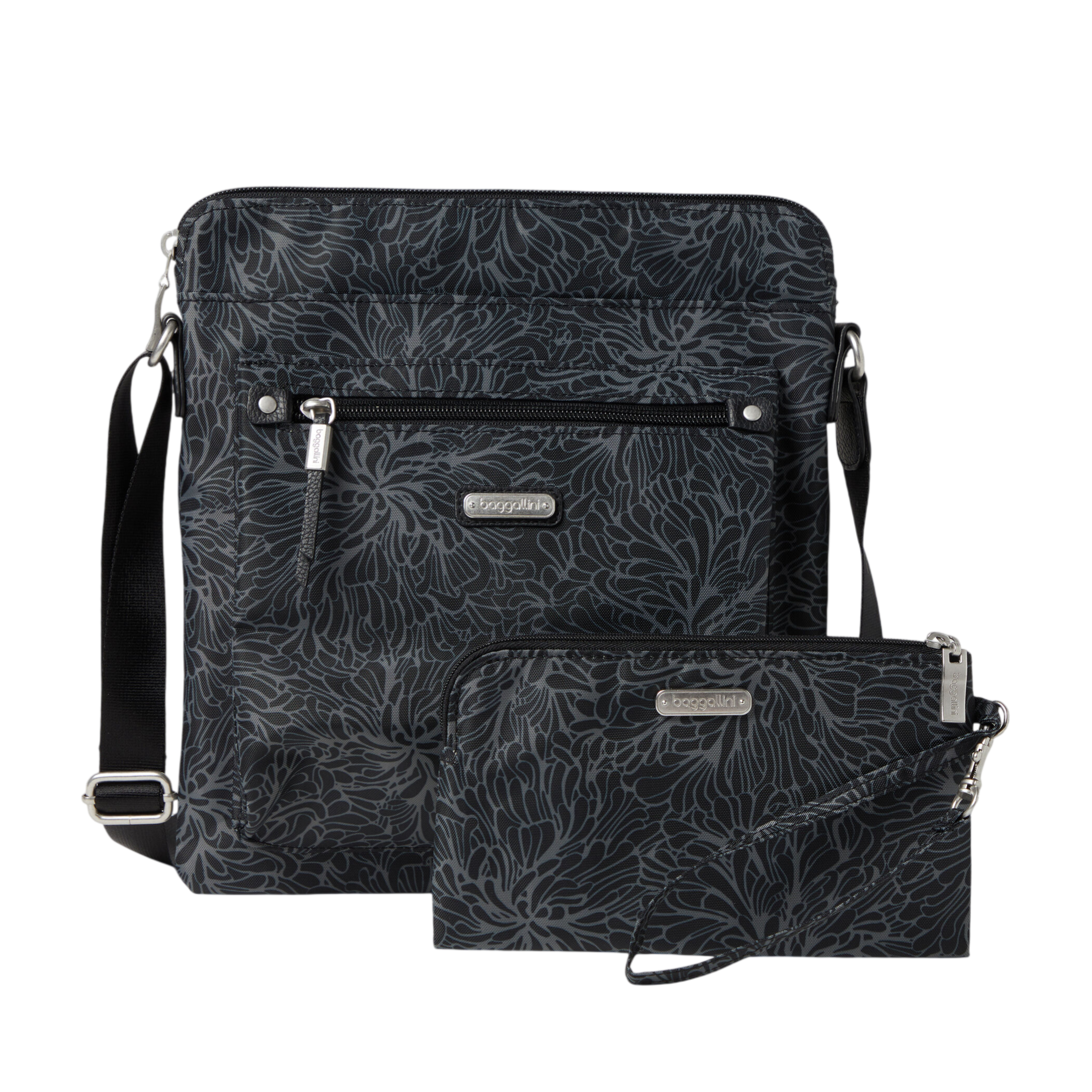Black crossbody bag and pouch set with a floral pattern, featuring zippers and a detachable strap.