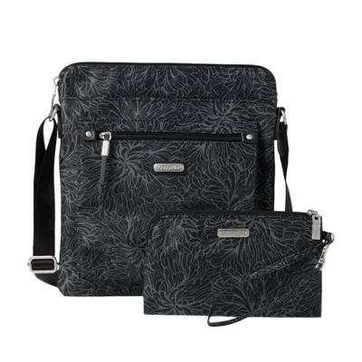 Black crossbody bag and pouch set with a floral pattern, featuring zippers and a detachable strap.