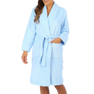 A light blue terry cloth robe featuring a shawl collar, long sleeves, and a self-tie belt at the waist, with two front pockets.