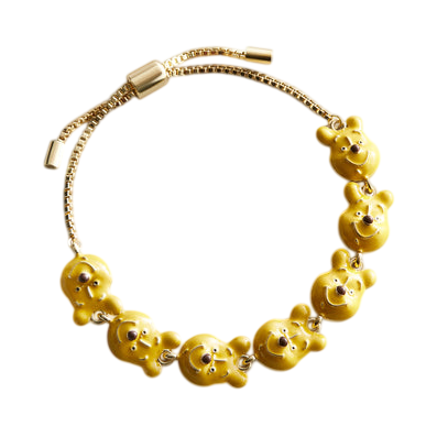 A bracelet featuring a chain of yellow bear-shaped charms with a sliding clasp for adjustment.