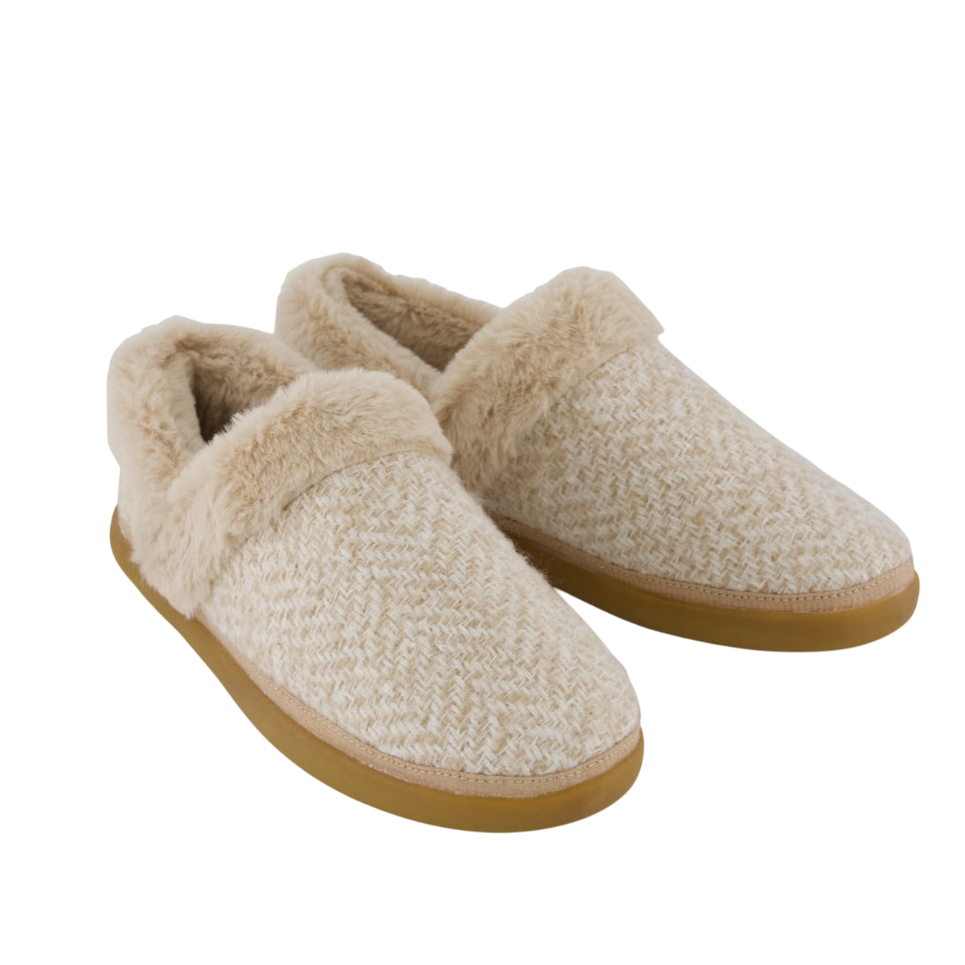 Cream-colored slippers with faux fur trim, featuring a herringbone pattern and rubber soles.