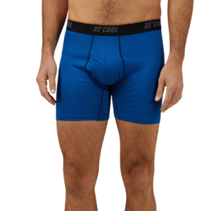 A person is wearing blue boxer briefs with \“32° COOL\“ branded on the waistband, featuring a supportive pouch design.