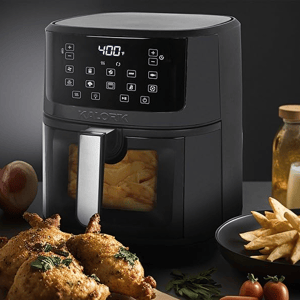 A black 7qt Kalorik Air Fryer with a digital touch screen displaying 400°F, accompanied by roast chicken and fries.
