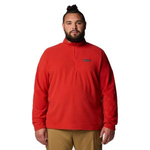 A plus-size Columbia fleece pullover in red, featuring a quarter-zip design and a Columbia logo patch on the left chest. The model is wearing khaki pants.